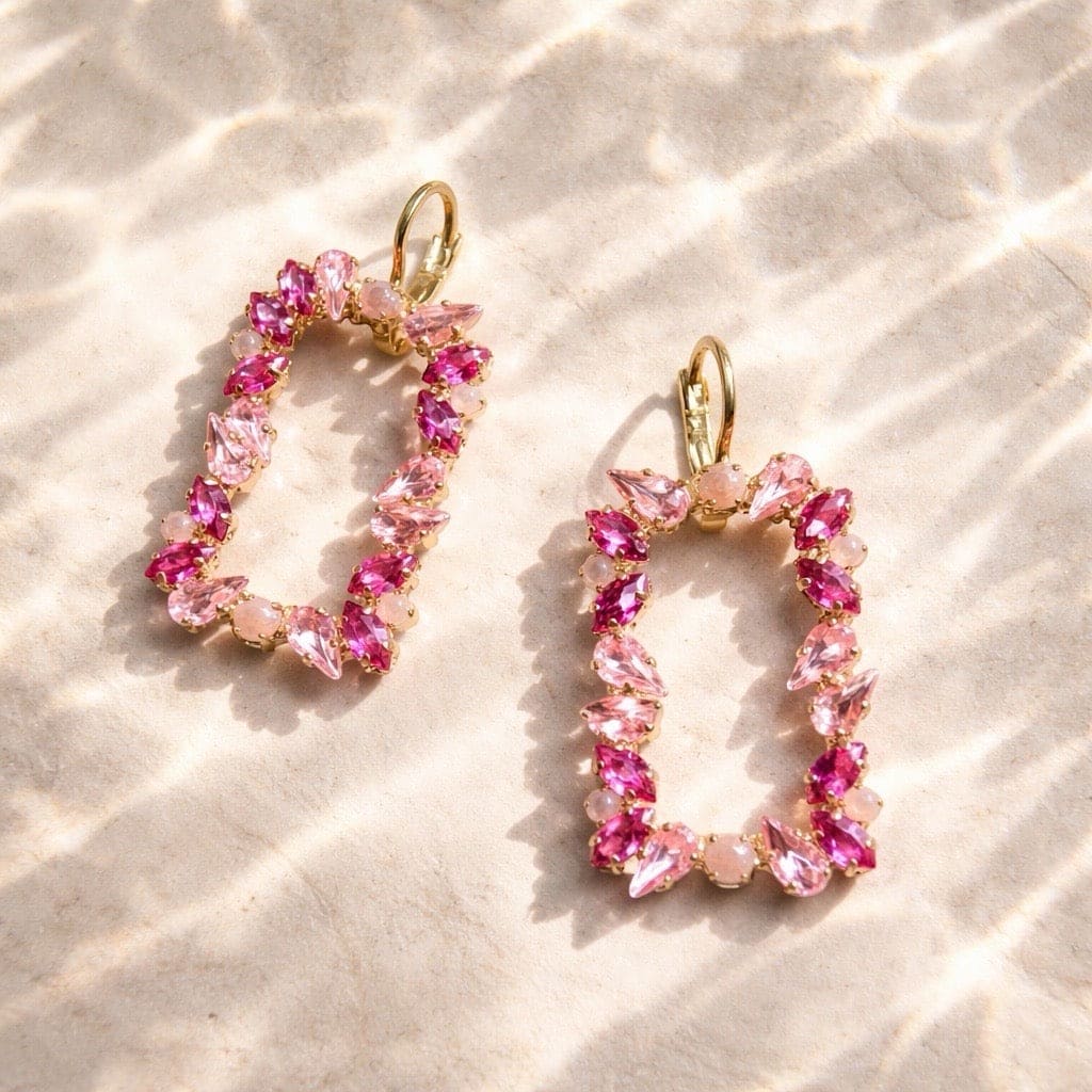 Roze kristallen oorbellen met ovaal design en meerdere roze tinten, goudvergulde nikkelvrije hypoallergene statement oorhangers voor dames
