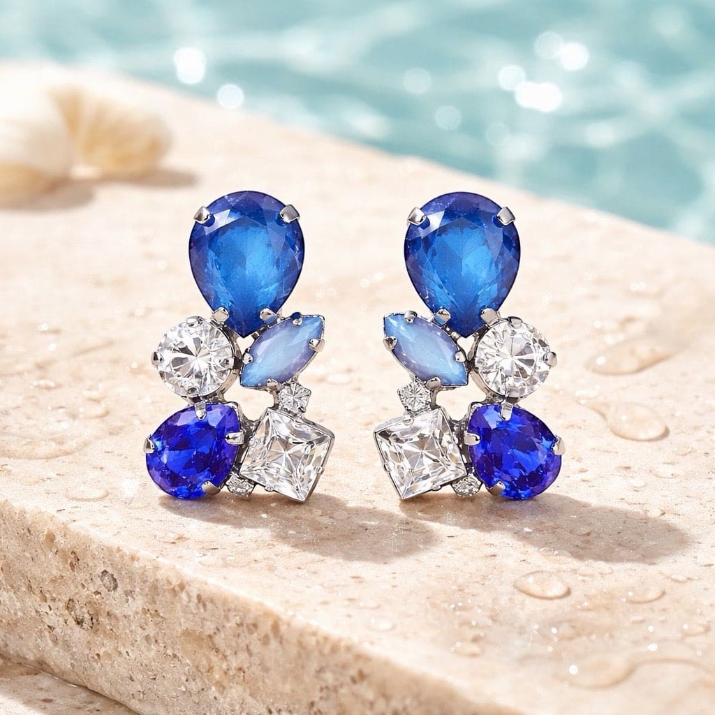 Luxe blauwe kristallen oorstekers met 7 kristallen in verschillende blauwe tinten, zilververgulde nikkelvrije en hypoallergene statement oorbellen voor dames
